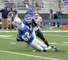 Palmer's Adam Christiansen (62) and Ryker Carrington (74) sack North Pole's Garrett Sommer duringa a 54-49 win over the Patriots. "MatSuSports.net"