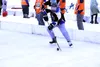 Roman Holler, who skates with the Valley Thunder, handles the puck during a tournament game on the first day of the Last Frontier Pond Hockey Classic in Big Lake. Tim Rockey/Frontiersman