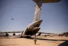 Airmen from the 22nd Airlift Squadron prepare a C-5M Super Galaxy to take lifesaving COVID-19 supplies to India, April 28, 2021, at Travis Air Force Base, California. The United States govern