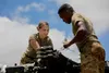 U.S. Army Pfc. Tess Sandoval assigned to 2nd Squadron, 6th Calvary Regiment, 25th Combat Aviation Brigade is one of two female attack helicopter repairers in the squadron located on Wheeler A
