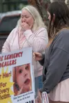 Judy Eyre-Breuer, the grandmother of Alena Toennis, speaks with media during a rally at the Palmer Courthouse Monday afternoon. J. David McChesney/Frontiersman