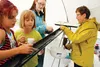 Lee Henrickson of Sister City Program Palmer Saroma Kai sent oodles of noodles, grapes, and tomatoes down the Palmer Pride Picnic’s famous noodle chute for hungry guests on Friday. Caitlin Sk