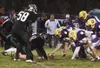 Brock Graziadi and the Lathrop Malemutes drive into Knight
territory in their 23-13 win over Colony Friday. Photo by JEREMIAH
BARTZ/ Frontiersman.