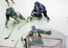 ROBERT DeBERRY/Frontiersman Kyle Pichler (15), left, and Tyler
Currier (16) crash the net during a recent home game for the Alaska
Avalanche. Pichler and Currier are two of four Avs chosen to