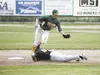 Mat-Su Miners infielder Nash Knight tries to catch the ball off the bounce as Anchorage’s Danny Susdorf slides into second base during the 2012 season. Knight recently earned the Miners’ Stan