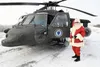 Santa Claus smiles after arriving in Circle, Alaska, on boardan Alaska Army National Guard UH-60 Black Hawk todeliver gifts to the children during Operation Santa Claus,Nov. 6, 2024. U.S. Air