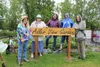 Marlene Munsell [center] stands with WASI residents at the main campus outside downtown Wasilla. Frontiersman file photo