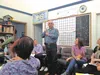 BRIDGE representative and Fairbanks PA Paul Finch shows members of the Mat-Su Opioid Task Force a new device to temper opioid withdrawal symptoms at a regular task force meeting at MY House h
