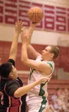 Colony sophomore Nathan Umbarger shoots for two points against
the Banning Pilots Wednesday at the Doc Larson's Roundball Classic
at Wasilla High School. (ROBERT DeBERRY/Frontiersman)