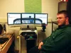 Junior Frank Kelly sits in the simulated cockpit that he built for the aviation course at Su Valley High School. Courtesy Ed O’Connor