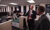 Deven Mitchell, executive director of the Alaska Permanent Fund Corp., gives a tour of the corporation's investment floor to Sen. Jesse Kiehl, D-Juneau, and other attendees of an open house o