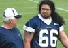 Photo courtesy of Junior Aumavae Junior Aumavae, a former Palmer
High School standout, talks with Dallas Cowboys head coach Wade
Phillips, left, during an organized team activity recently. Au