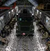 A fuel truck and passengers fly on a Dover Air Force Base C-17 Globemaster III during exercise Razor Talon at Seymour Johnson AFB, North Carolina, March 23, 2021. Mobility Airmen participated
