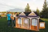 Lisa and Becca Coleman and Babs Henricksen, an honorary Coleman, joined to form the Coleman Ladies team at Cardboard City 2014. Becca said the design for their house was inspired by one featu