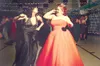 (ROBERT DeBERRY/Frontiersman) Ellen Parker, left, and Sharon
Hernandez move to the beats under the colored lights at the
Bruchell 2008 prom Friday night. Parker and Hernandez along with 35
ot