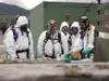 Cleanup and eradication of methamphetamine labs often require
extensive protection and face masks to prevent health problems from
the toxic chemicals. Photo courtesy of Alaska State Troopers