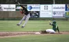 Peninsula Oilers infielder Victor Carlino leaps up into the air to grab the throw to second as Mat-Su’s Erik Webb slides in safely during an 8-4 loss to the Miners Tuesday, June 18, 2019 in P