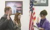 MICHAEL ROVITO/Frontiersman Gov. Sarah Palin swears Jessica
Newton and Justin Lawson into the Alaska Air National Guard Monday
at the ribbon cutting for the unit’s new recruiting office in
Wa