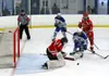 Palmer's Stuart McQuillin takes a shot at a loose puck in front of the crease during a 4-2 win over the Wasilla Warriors Jan. 16 at the MTA Events Center. Courtesy of Bruce Eggleston/matsuspo