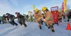 The three race teams make a mad dash from the start line at the 2025 Willow Winter Carnival Outhouse Race on Willow Lake. J. David McChesney/Frontiersman