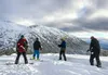 A group of snowboarders prepares to descend a slope in Hatcher Pass on Tuesday, Nov. 10, 2015. The pass is a popular destination for winter recreation, but also potentially deadly — officials