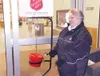 Maj. Verna Hughes of the Salvation Army Mat-Su smiles at Fred
Meyer customers Thursday while ringing a bell by the familiar red
kettle. (GREG JOHNSON/Frontiersman)