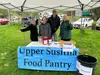 Upper Susitna Food Pantry Executive Director LouAnne Carroll-Tysdal, far right, poses with staff Photo courtesy of Upper Susitna Food Pantry