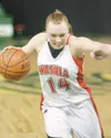 Wasilla Warrior Skyler Nuss drives towards the basket during the
Warrior's game against the Chugiak Mustangs Friday evening at the
Sullivan Arena in Anchorage. (ROBERT DeBERRY/Frontiersman)