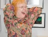 Suzanne Bach reacts to a surprise party given for her by students at Mat-Su College April 25. Submitted photo