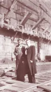 Photo courtesy of the Alpine Historical Society Two people stand
in front of coal bunkers at Jonesville Mine in an undated photo
donated to historians by Robin Allen and Craig Thomas,
grandch