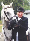 Marion Sindorf takes a moment with Suavicito on Aug. 11, the day
Sindorf entered the Century Club. Photo courtesy of Katie
Rousey.