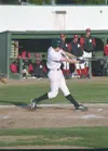 Mat-Su infielder Mike Kelly takes a swing at a pitch during the
Miners' 11-3 win over the Peninsula Oilers on Thursday. Photo by
Jeremiah Bartz/Frontiersman