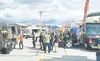 Hungry attendees check out food truck options at last week’s season-opening Friday Fling. The popular open-air market runs each week from 11 a.m. to 6 p.m. through Aug. 14 in downtown Palmer.
