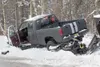 A pickup truck and snowmachine sit wrecked in a ditch off
Soapstone Road near the intersection of Smith Street on Nov. 13,
2010. The accident sent 8-year-old Christian Aldrich to the
hospital