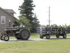 A tractor pulls a wagon filled with people attending Agriculture Appreciation Day at the Palmer Center for Sustainable Living Thursday afternoon. Rachel Kenley Fry/For the Frontiersman