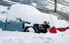 A pick-up truck sits covered with fresh snow on Tuesday, Nov. 10, 2015 near Hatcher Pass. Matt Tunseth/Frontiersman.com