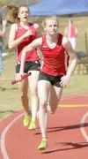 ROBERT DeBERRY/Frontiersman Wasilla freshman Morgan Dampier
starts her leg of the 1600 meter sprint medley relay Saturday at
the Palmer Relays.