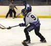 Palmer's Dylan McKenzie sends a pass across the ice in the first
period of Wednesday's game against the Bartlett Bears. Photo by TIM
BRODT/Frontiersman.