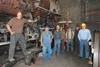 557 Mechanical Department volunteers Chief Mechanical Officer Jeff DeBroeck; President Patrick Durand; engineer-in-training James Ogden; master welder Larry Erickson; helicopter mechanic Jerr