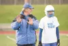 ROBERT DeBERRY/Frontiersman Coach Brad Hanson explains a play to
a member of the Palmer Moose football squad during Thursday
practice at Palmer High School.