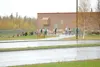 ROBERT DeBERRY/Frontiersman Colony Middle School students return
to the school after a brief evacuation this morning when officials
learned a chemical was missing from a science laboratory.