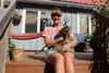 Kelleigh Orthmann holds a 20-year-old rescued cat named Becky at her home. Jacob Mann/Frontiersman