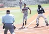 Alaska Road Warriors outfielder Kevin Christopher sprints down the base line and crosses home plate during an 11-1 win over the Eagle River Monday afternoon in Anchorage. With the win, the Ro