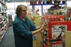 Just Imagine Toys owner Mary Scheie tidy's up around her store. Jacob Mann/Frontiersman