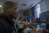Marine Corps Sgt. Marcus Mckeller prepares his robot before competing in a robot fighting competition on Camp Hansen, Japan, Dec. 11, 2019. Mckeller, a native of Wilmington, N.C., is an ammun