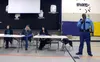 Alaska State Troopers Captain Tony April address a crowd gathered at Butte Elementary Wednesday. The residents who attended are concerned about a notorious problem property in the Butte. Tim 