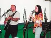 Submitted photo John Cook's latest CD features the singing of
Allison Ingram. "Her voice, it springs my songs to life," Cook
said.