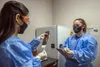 Alejandra Ornelas, Operation Warp Speed research pharmacy technician, documents and verifies whether a patient receives a vaccine or placebo, Oct. 28, 2020, at Joint Base San Antonio-Lackland