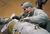 Air Force Master Sgt. Anderson Flansburg, a native of Germantown, Tennessee, assigned to the 3rd Munitions Squadron trains his Airmen while they build a 2,000-pound Guided Bomb Unit 31 versio