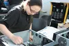 Houston Middle School sixth-grader Judi Wilson follows an instruction sheet during the Alaska Native Science and Engineering Program’s Computer Build event at the University of Alaska Anchora